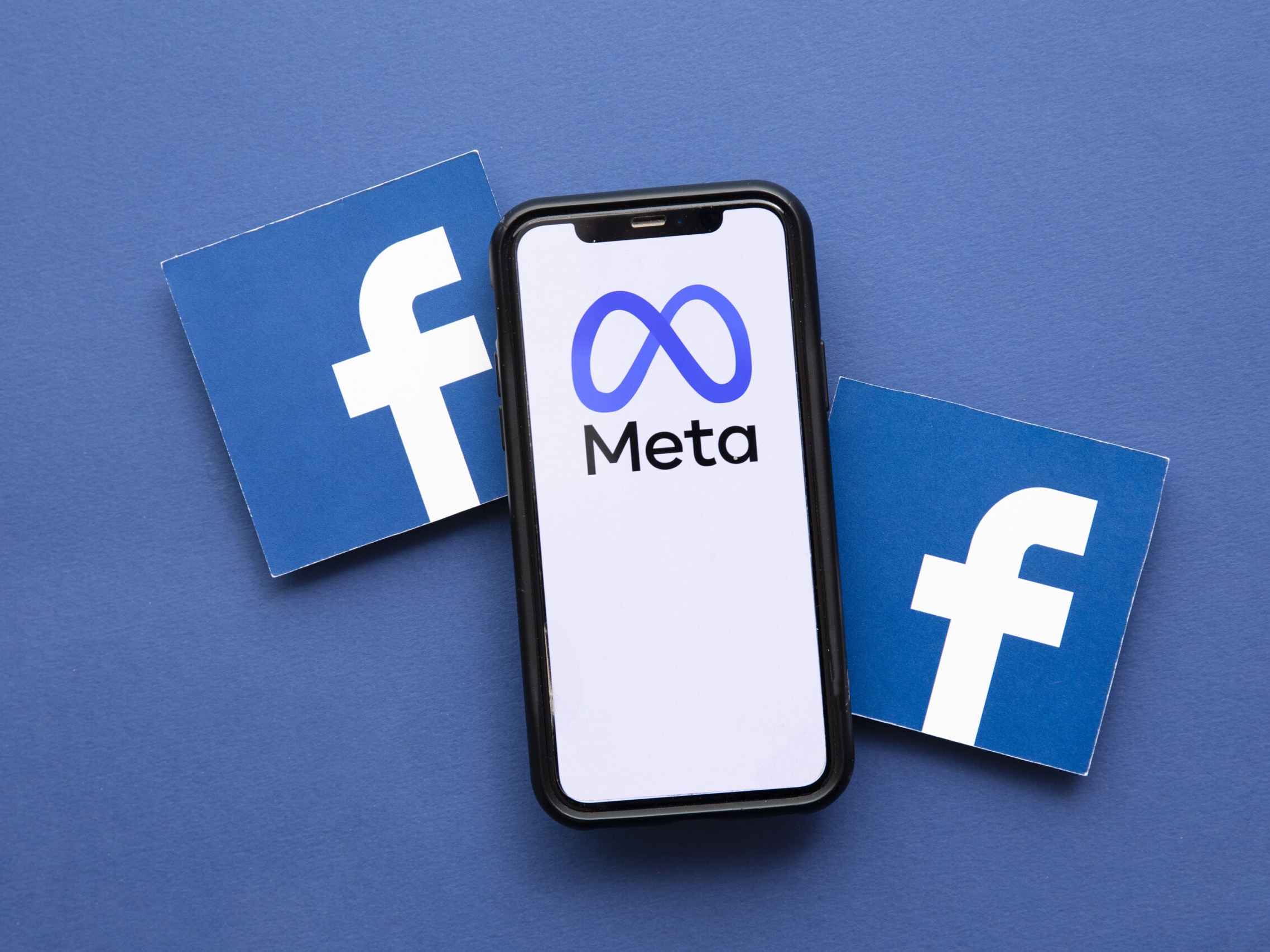 Facebook illustration: Facebook social media company changes its corporate name to Meta.
