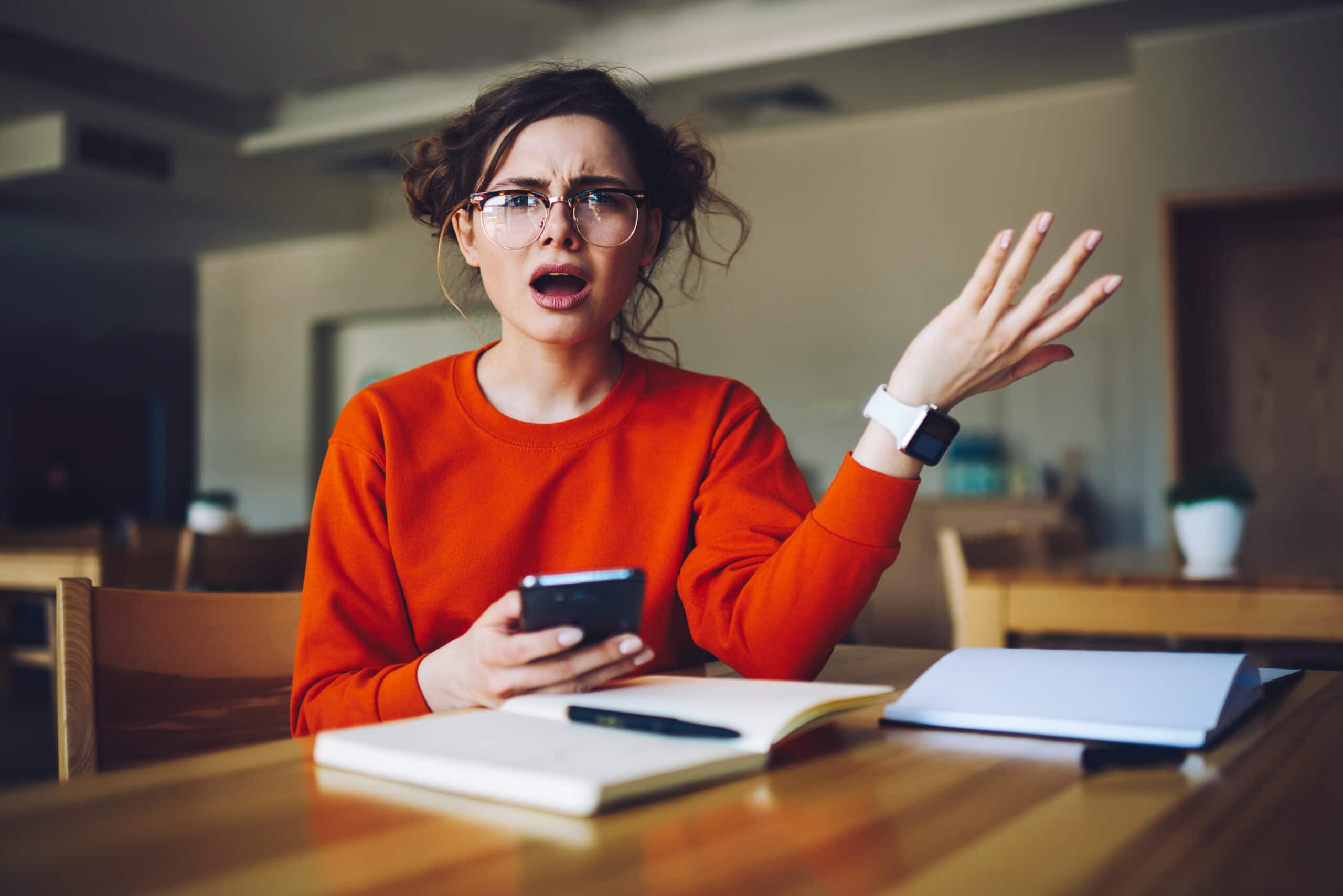 What is timeNough? 16 Pitch Deck slides revealed for a better understanding (illustration 1): portrait of confused hipster girl sitting with open mouth disappointed of examination testing receiving feedback on smartphone connected to internet, young student angry about bug in phone application