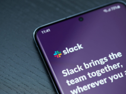 Slack app menu on smartphone screen close up view