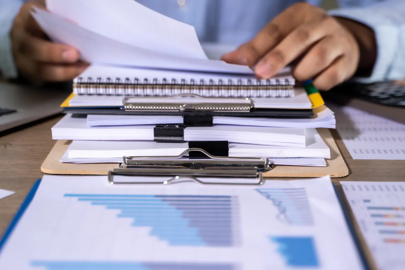 Businessman working reading documents graph financial to job success