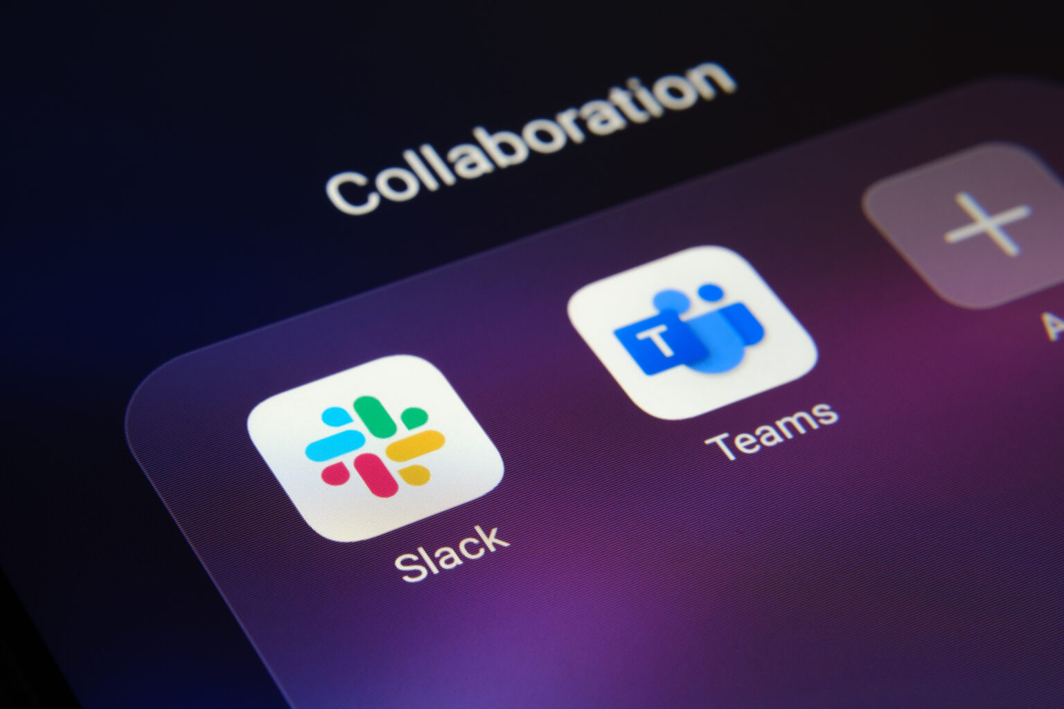 This is a corner of a smartphone with Slack and Teams apps.